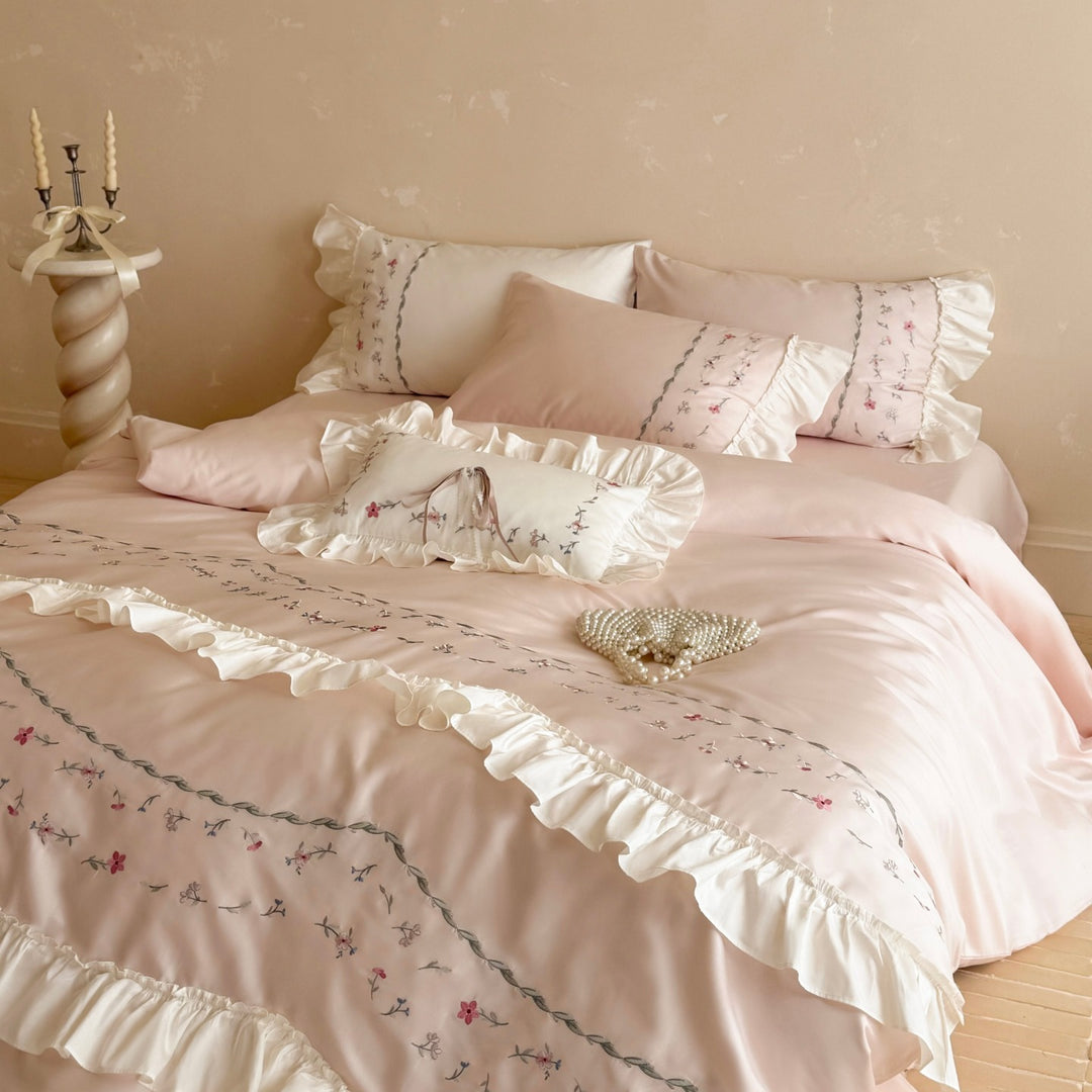 Romantic bedding set with ruffles and floral embroidered cotton satin