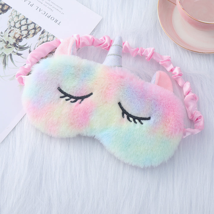 Women's plush-filled unicorn sleep mask with 3D horn, embroidered eyelashes and adjustable satin band Stornfield