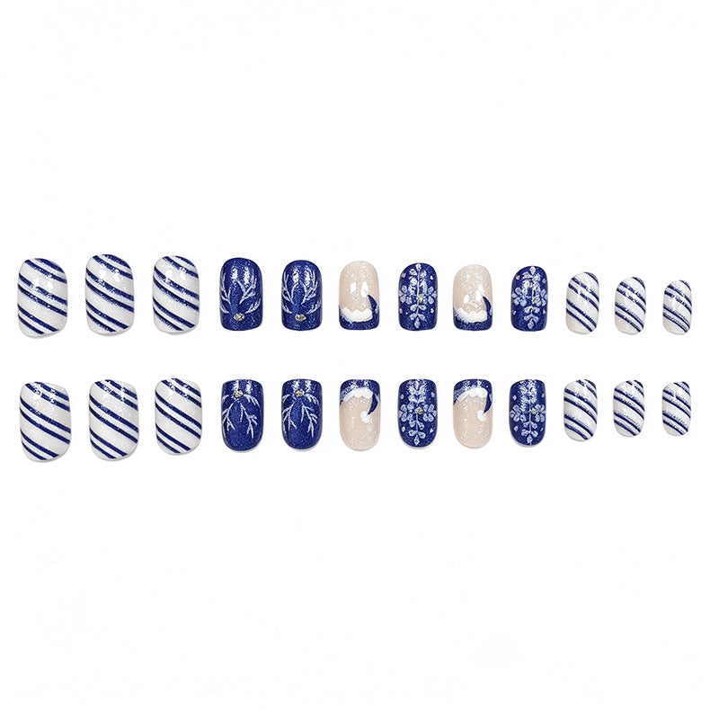 Artistic Winter-Themed Acrylic Nail Art Enhancements Stornfield
