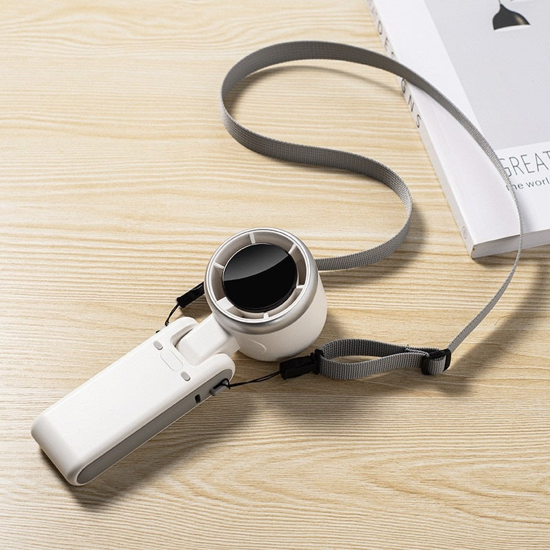 Cooling foldable rechargeable handheld mini fan with digital LED speed display and multi-position stand Stornfield