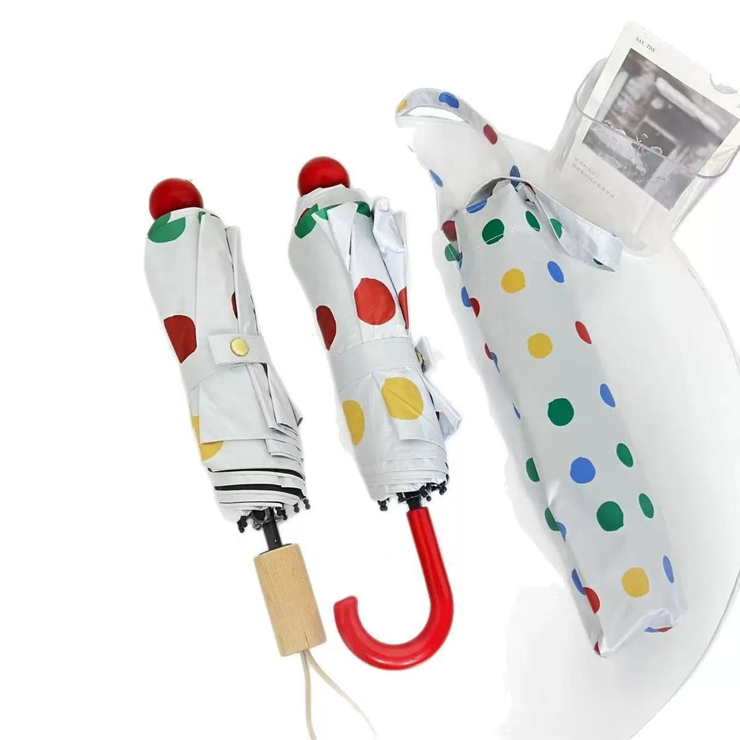 Ladies designer foldable umbrella with colorful polka dot pattern Stornfield