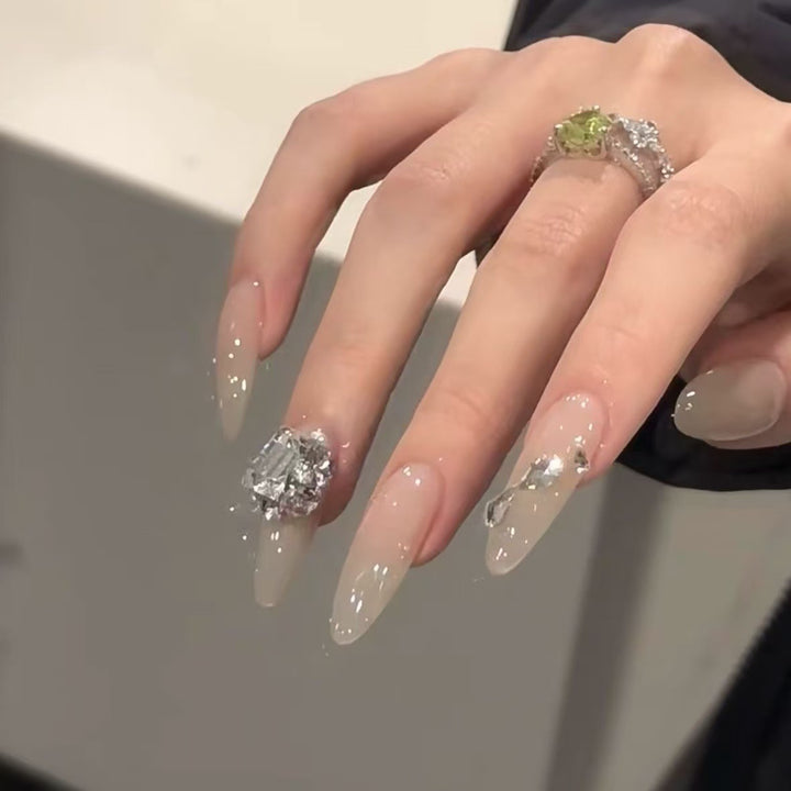 Elegant Stiletto Nail Extensions with Rhinestone Accents Stornfield