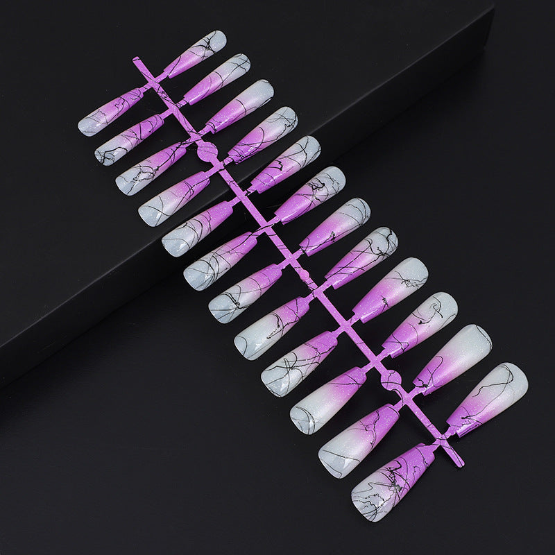 Artificial nails in modern ombre design with marbled accents Stornfield