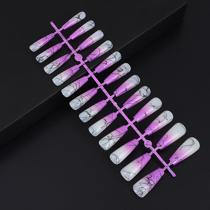 Artificial nails in modern ombre design with marbled accents Stornfield
