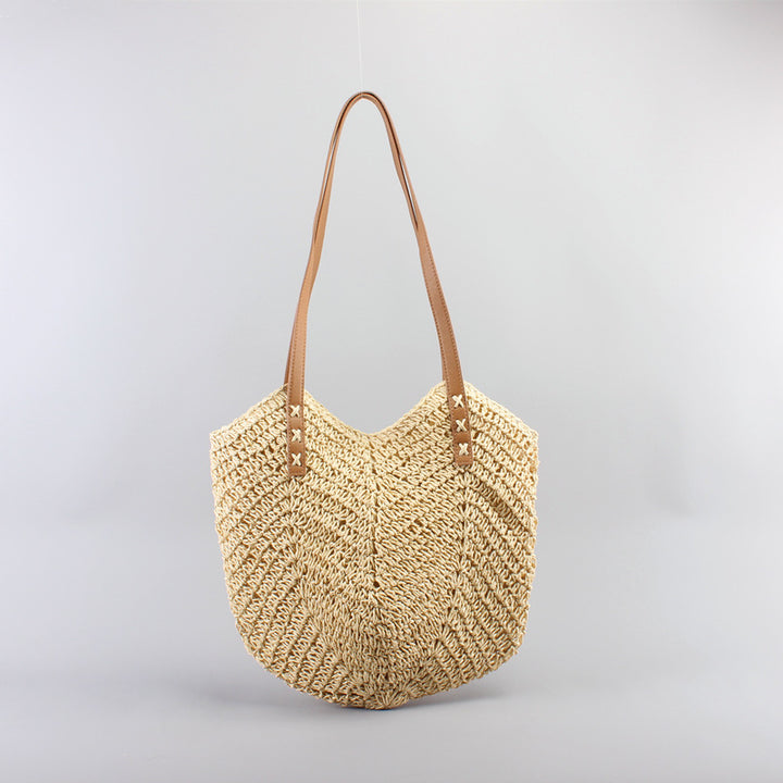 Casual bag made of handwoven straw with wide leather handles Stornfield