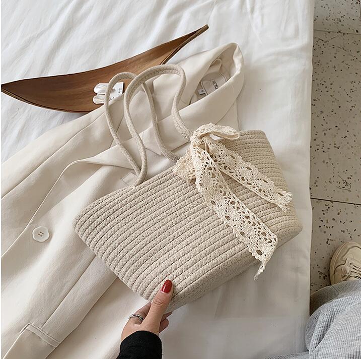 Elegant Bast Handbag with Lace Accent Stornfield