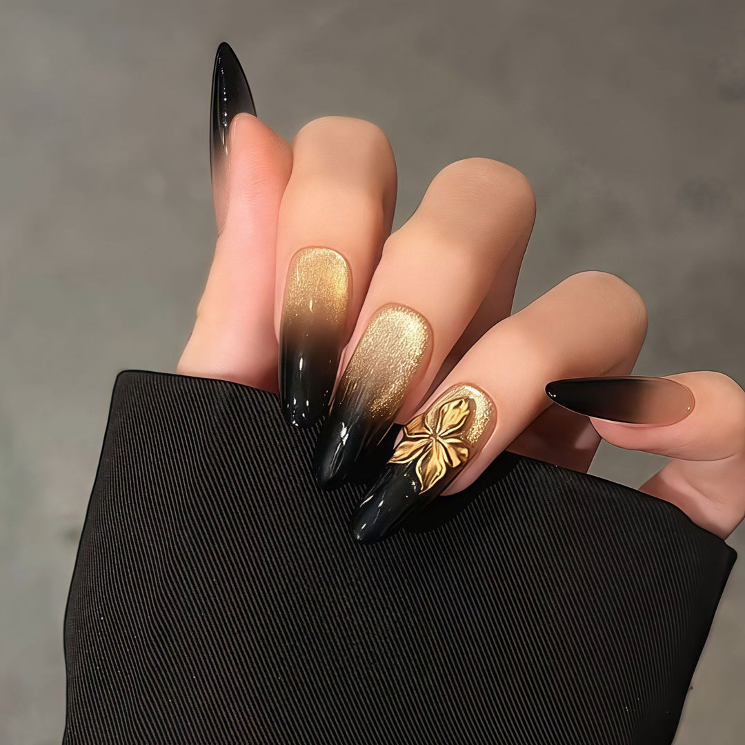 Glamorous artificial nails with intricate flower and glitter effects Stornfield