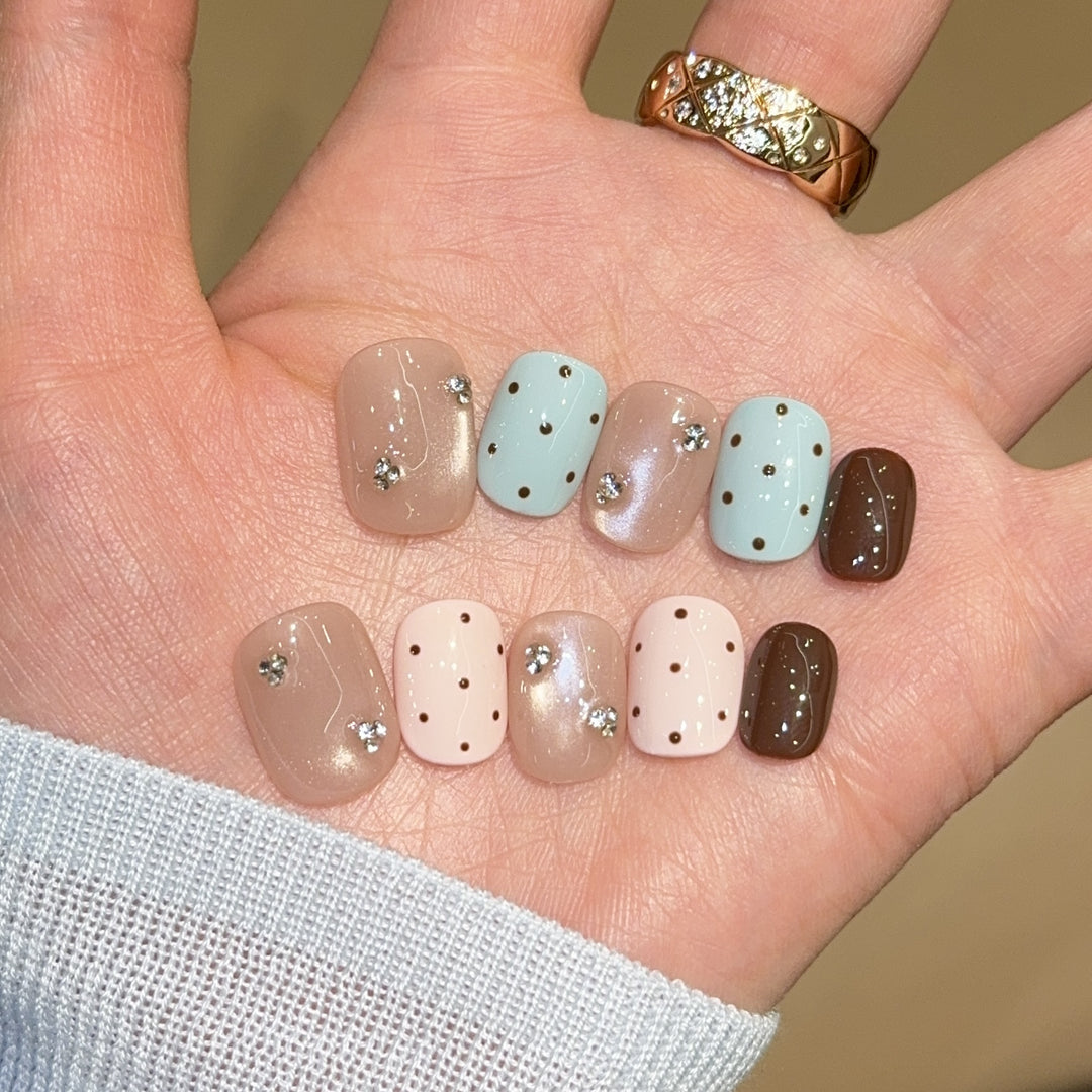 Acrylic nails with rhinestones and glitter Stornfield