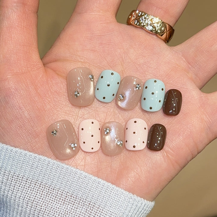 Acrylic nails with rhinestones and glitter Stornfield