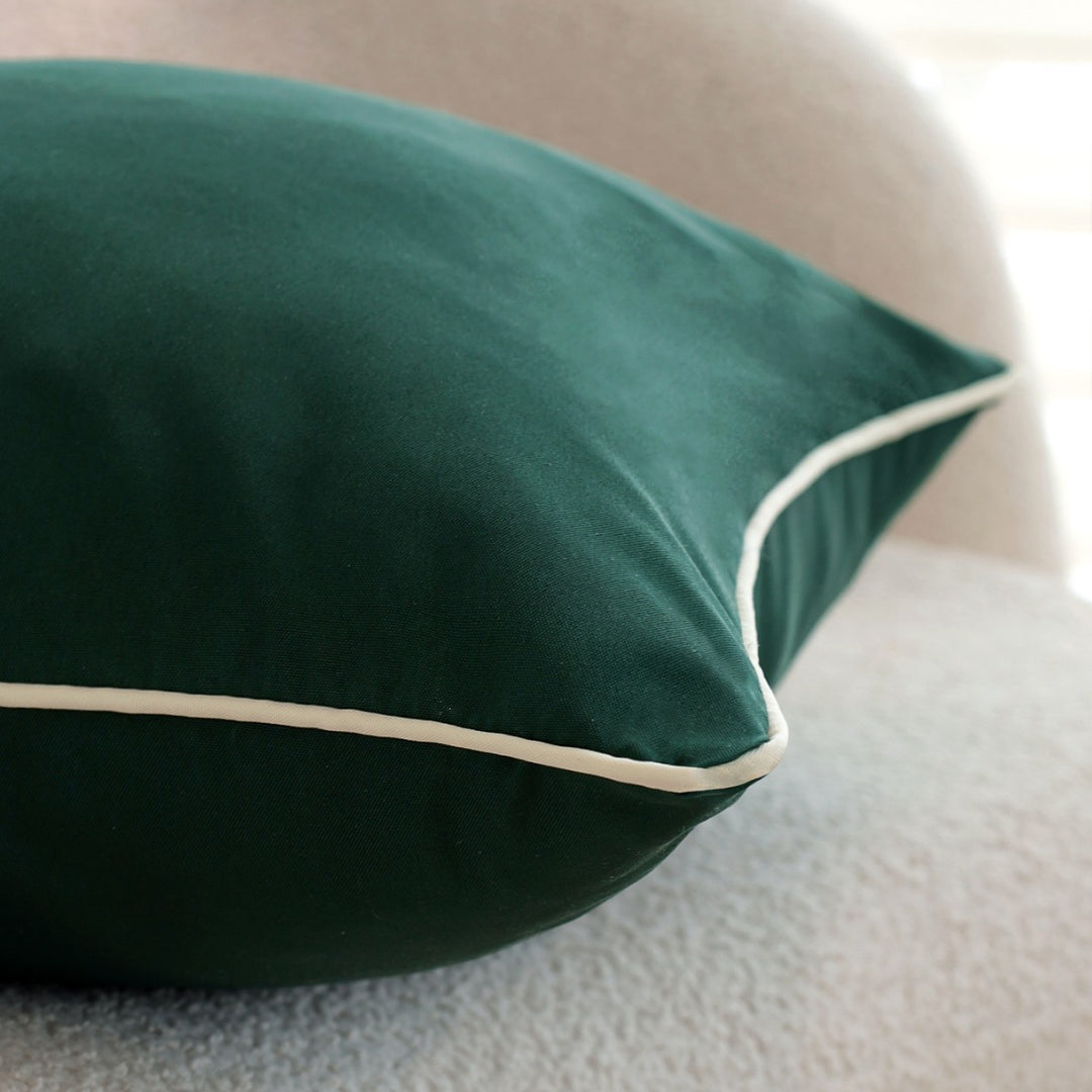 Luxurious decorative cushion with elegant piping