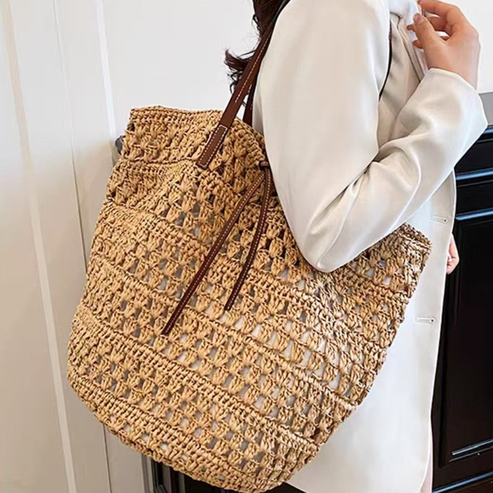 Woven natural material handbag with leather handles Stornfield