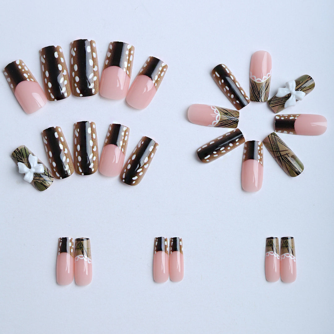 Artificial nails with elegant bow and pattern design Stornfield
