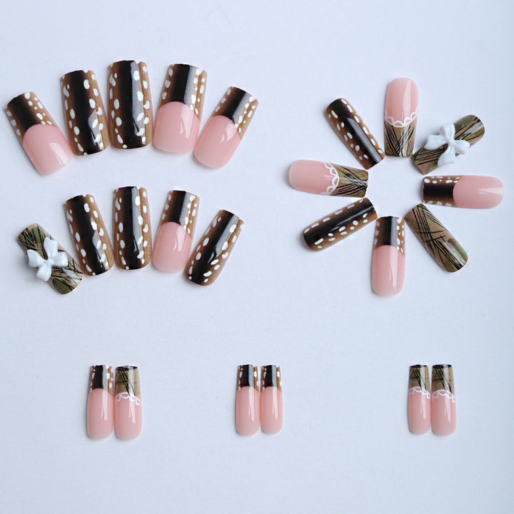 Artificial nails with elegant bow and pattern design Stornfield
