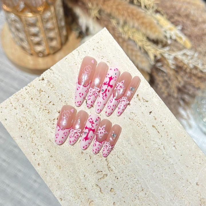 Artistic Stiletto Press-On Nail Set with Heart and Bow Design Stornfield