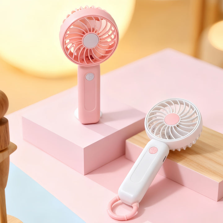 Women's portable battery-operated hand fan with ergonomic design and USB charging Stornfield