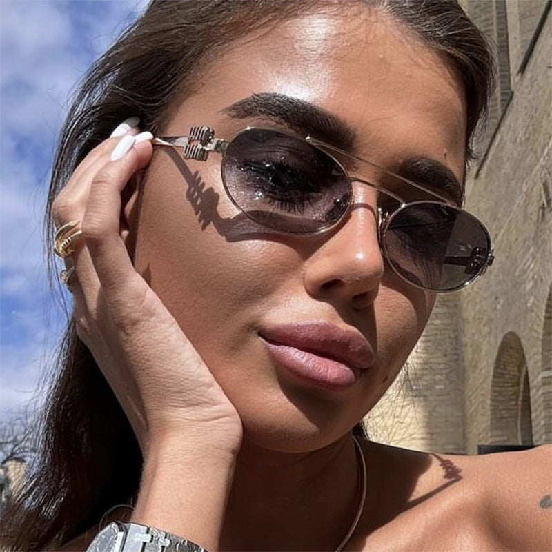 Women's elegant oval sunglasses with luxurious metal frame Stornfield