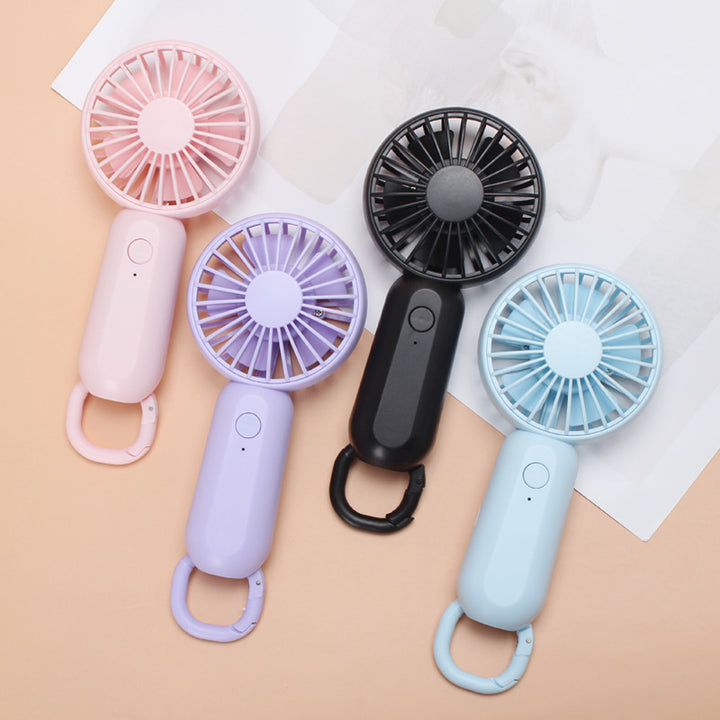 Women's compact portable handheld fan with rechargeable battery and carrying strap Stornfield