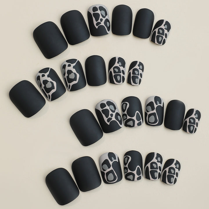 Artistic Press-On Nail Set with Elegant Design Elements Stornfield