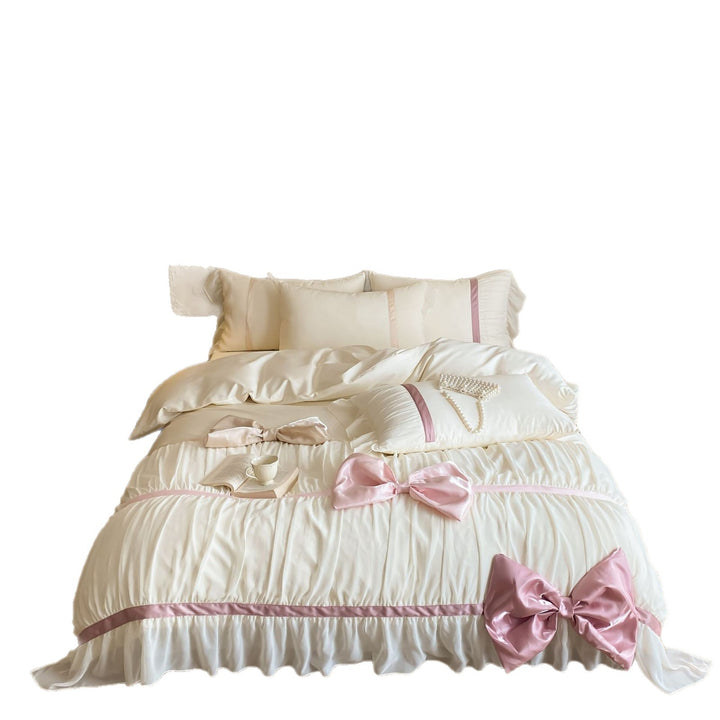 Bedding set with large satin bows, ruffled frill and decorative pillowcases