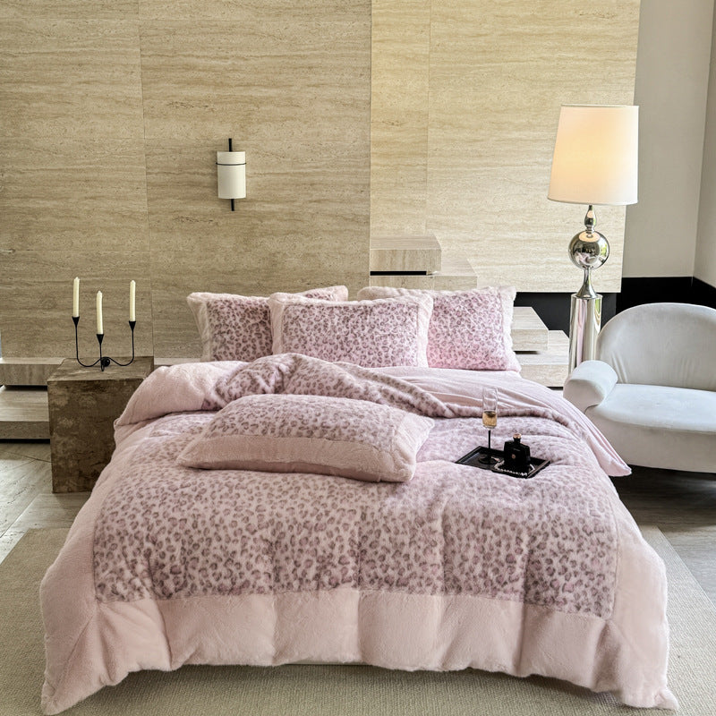 Plush bedding set with leopard faux fur and reversible function