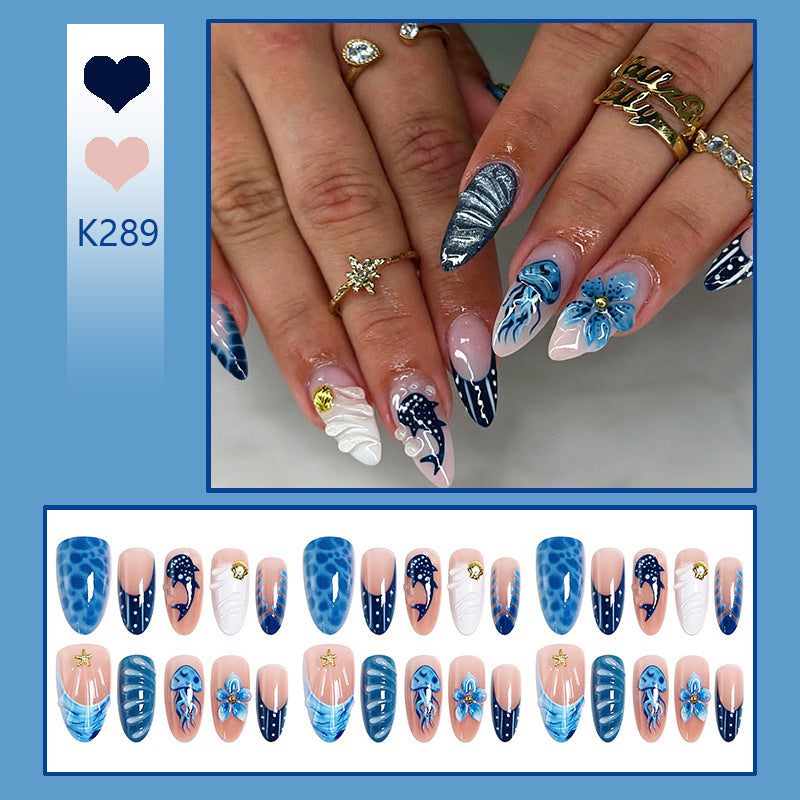 Artificial nails with maritime design and 3D flower accents Stornfield