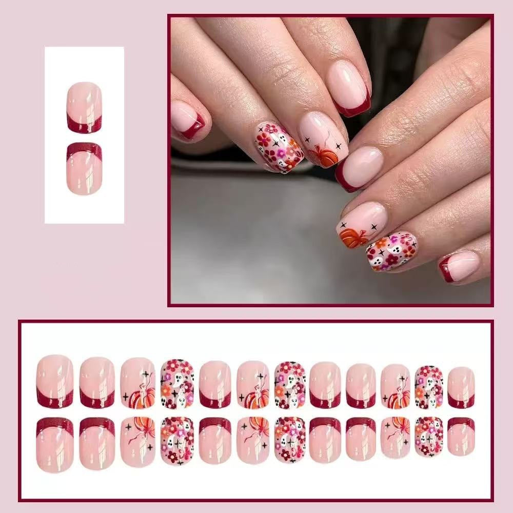 Artificial nail set with cheerful flower designs and elegant French tips Stornfield