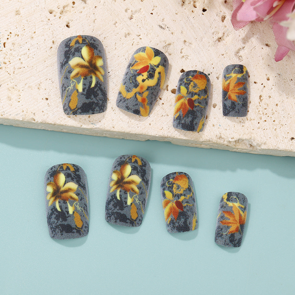 Artificial nails with colorful flower designs Stornfield