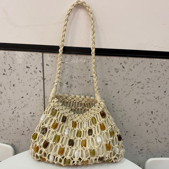 Hand-knotted net bag with decorative beads Stornfield