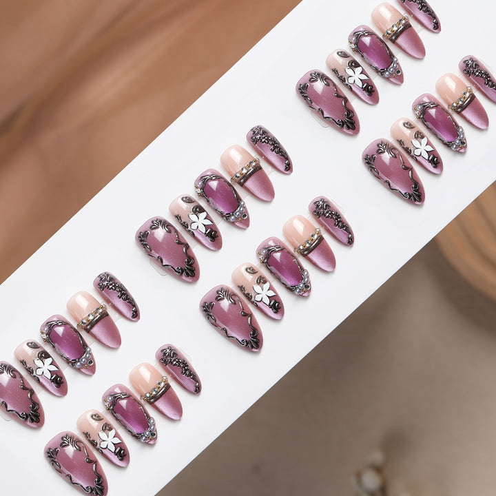 Acrylic nail set with floral design and glamorous accents Stornfield