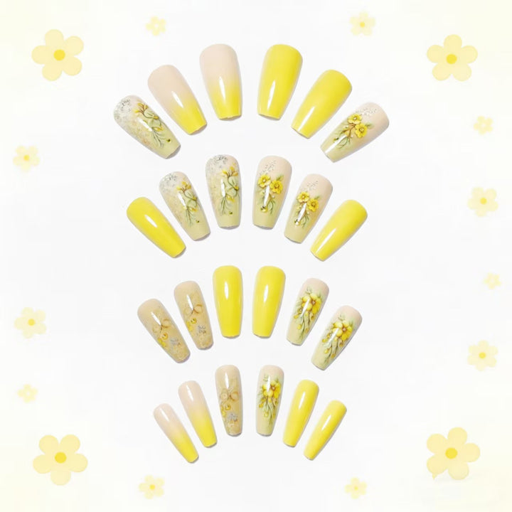 Artificial nails with floral embellishments and glitter Stornfield