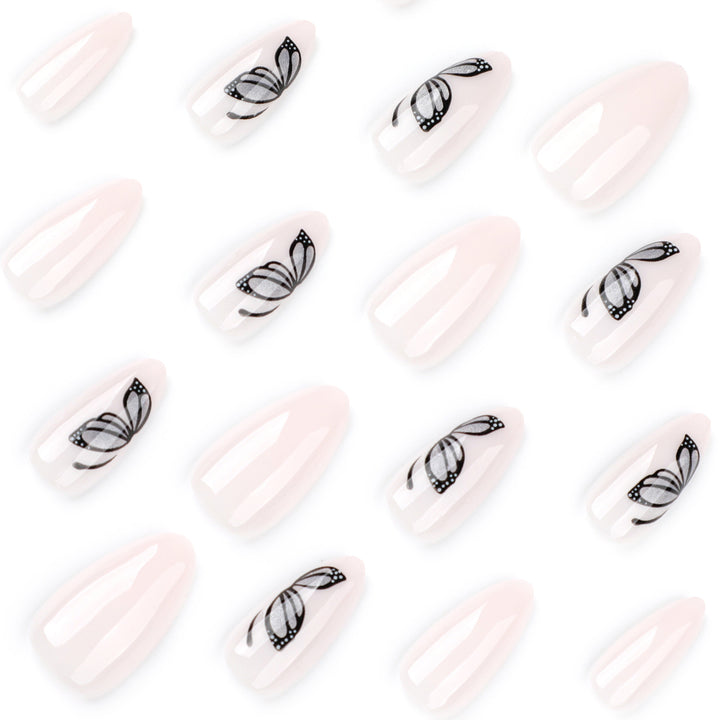Artful nail extensions with delicate butterfly design Stornfield