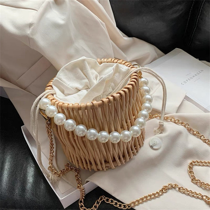 Women’s handbag with elegant pearl handle and braided design Stornfield