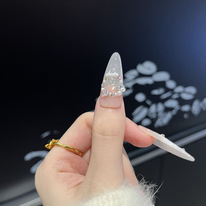 Artistic Press-On Nail Set with Snowflake and Gemstone Designs Stornfield