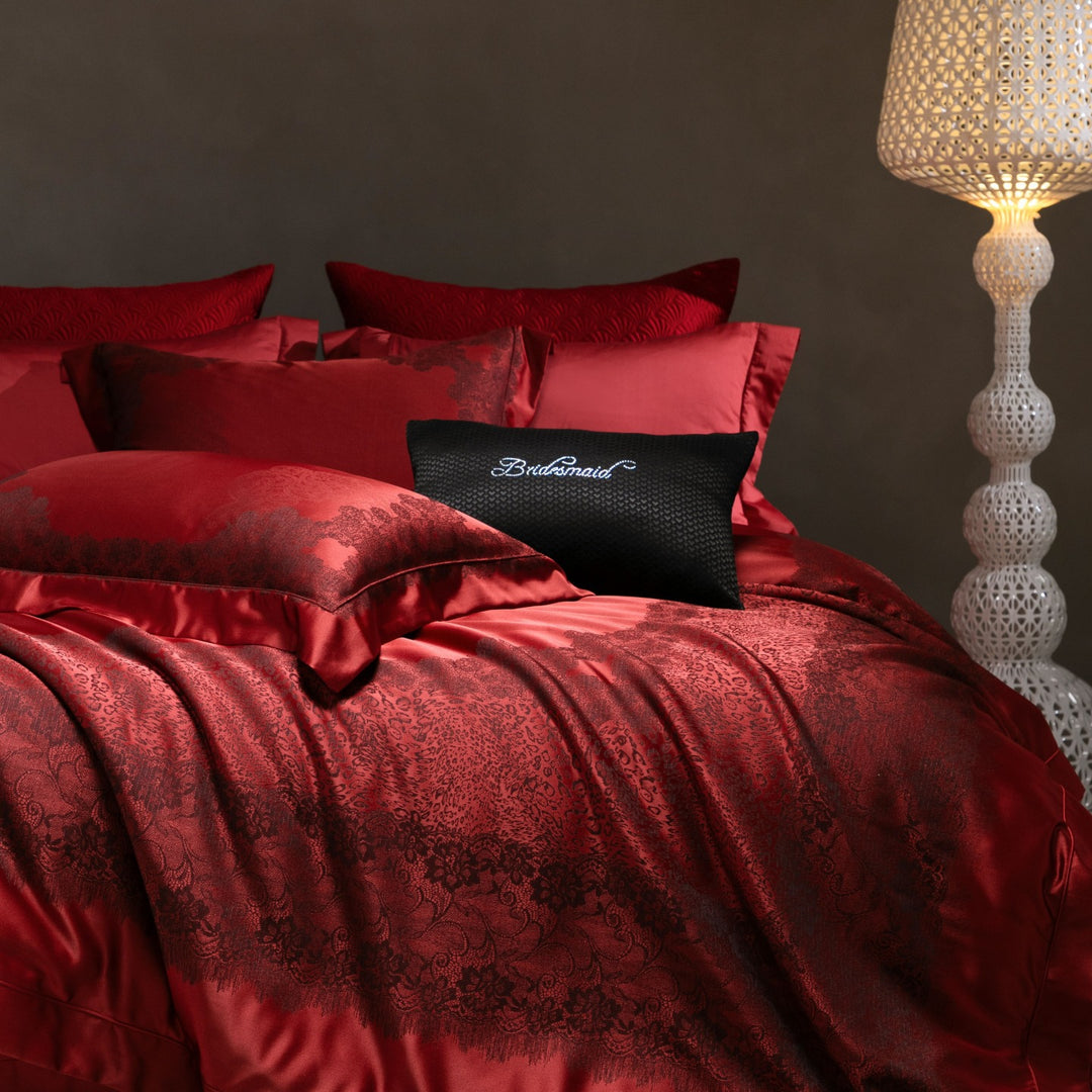 Luxurious satin bedding set with jacquard lace pattern and decorative pillow