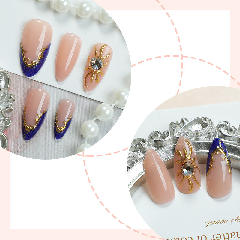 Nail art set with elegant gold-blue design Stornfield