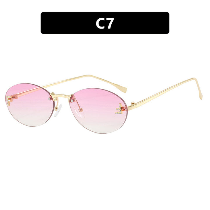 Women's fashionable sunglasses with elegant, round lenses and delicate metal frame Stornfield