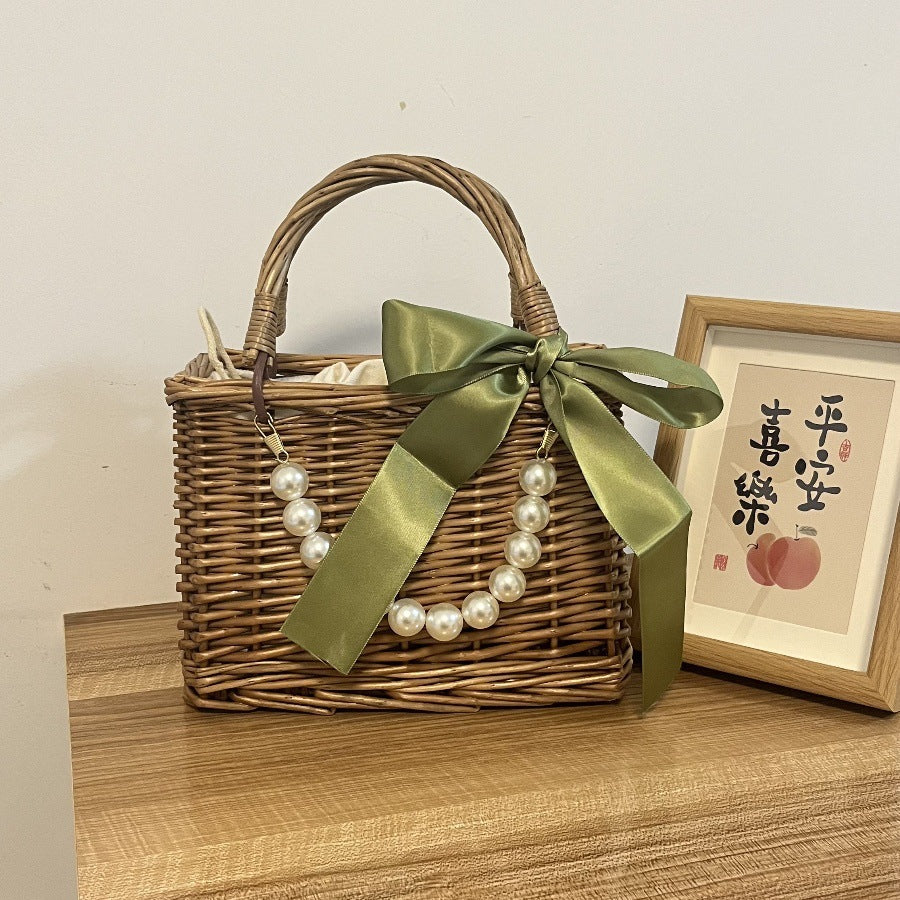 Ladies' basket bag with decorative pearl accents and bow decoration Stornfield