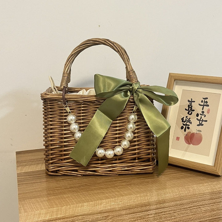 Ladies' basket bag with decorative pearl accents and bow decoration Stornfield