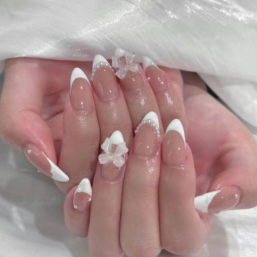 Nail art set with elegant tips and floral accents Stornfield
