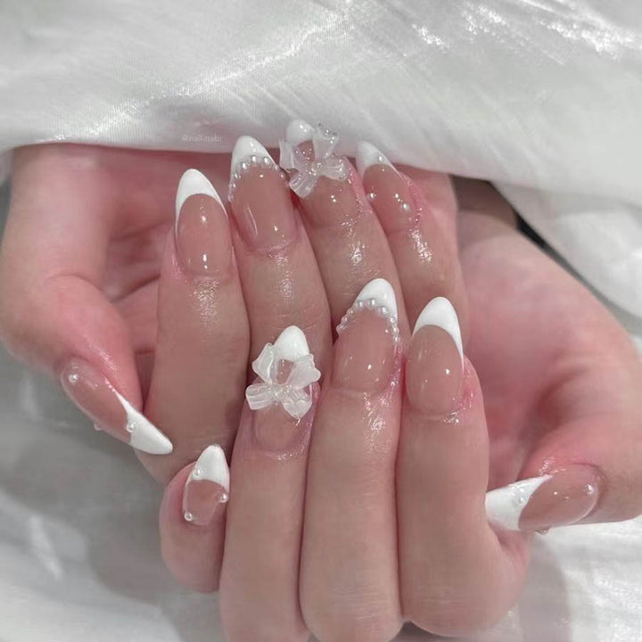 Nail art set with elegant tips and floral accents Stornfield