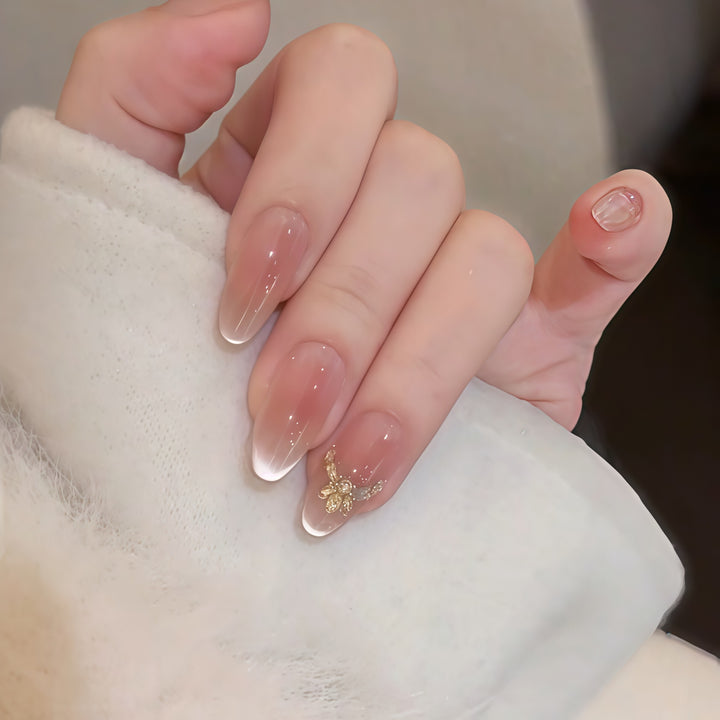 Artificial nails with elegant tip design and gold accents Stornfield