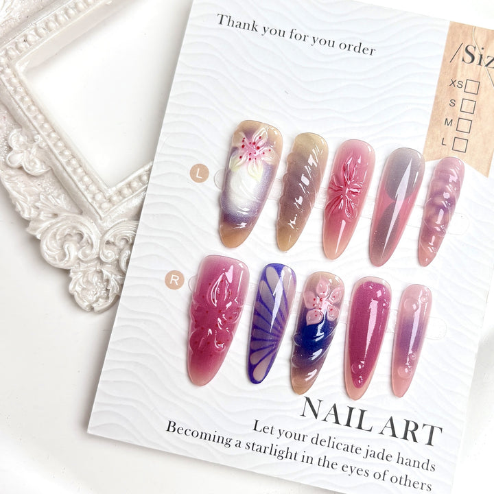 Decorative Press-On Nail Set with Floral and Artistic Designs