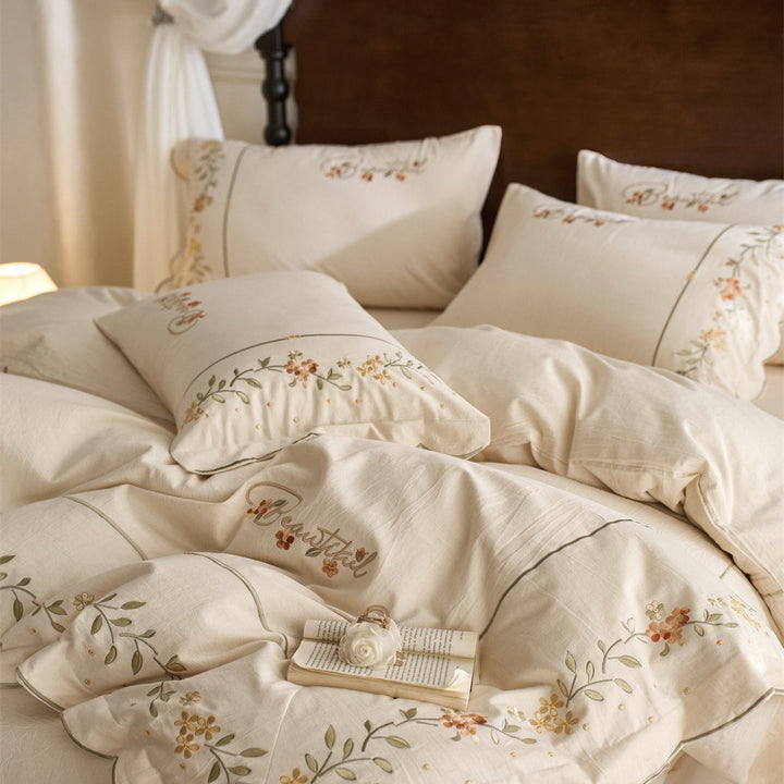 Embroidered Cotton-Linen Bedding Set with Wavy Hem and Floral Border Motif