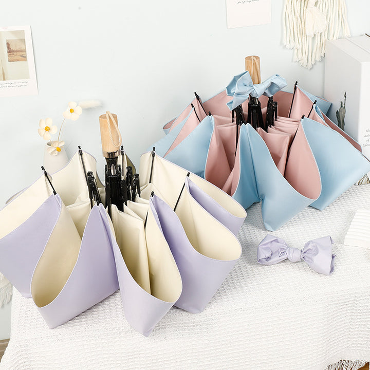 Women compact folding umbrella with stylish design and practical carrying strap Stornfield
