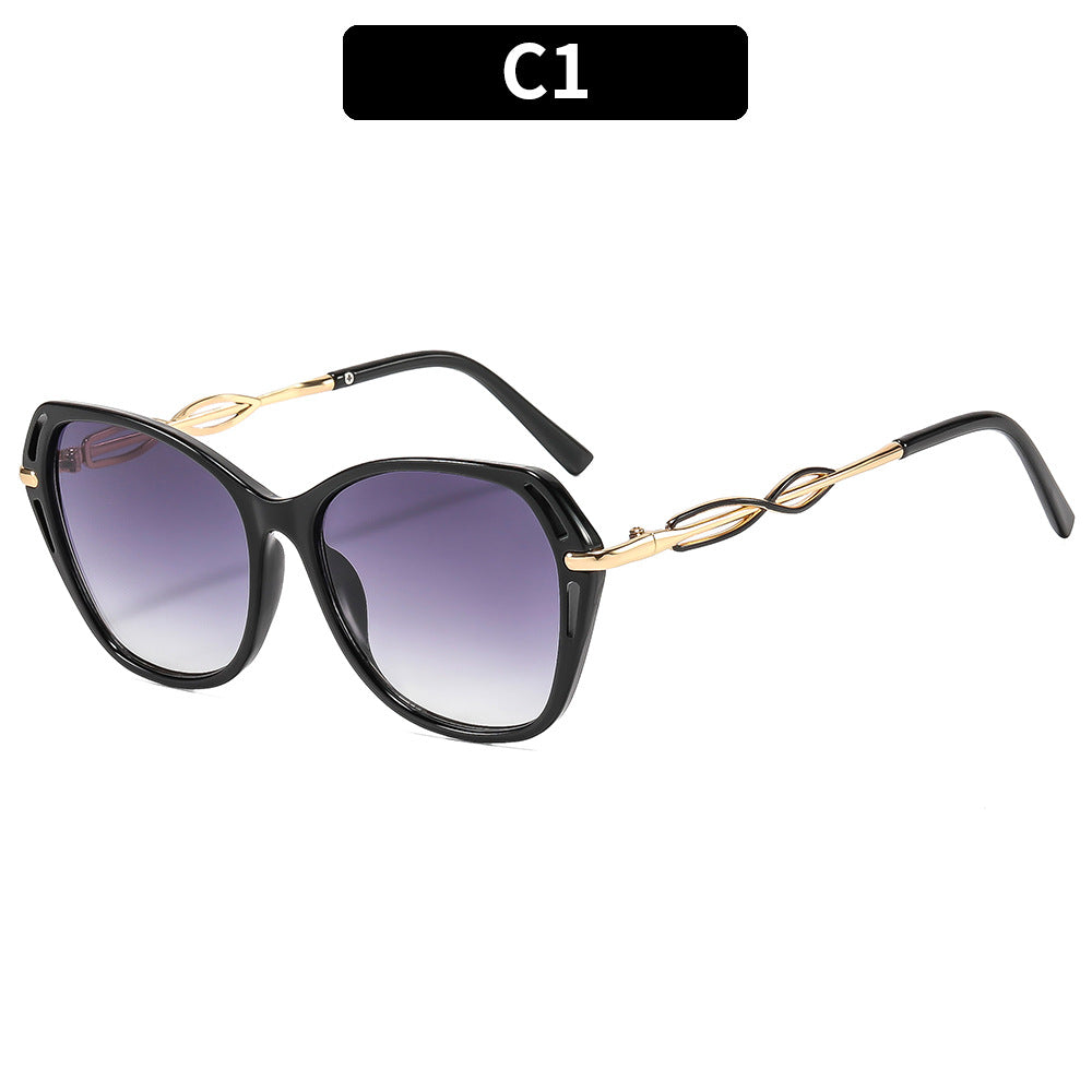 Stylish Cat-Eye Sunglasses with Elegant Gold Accents