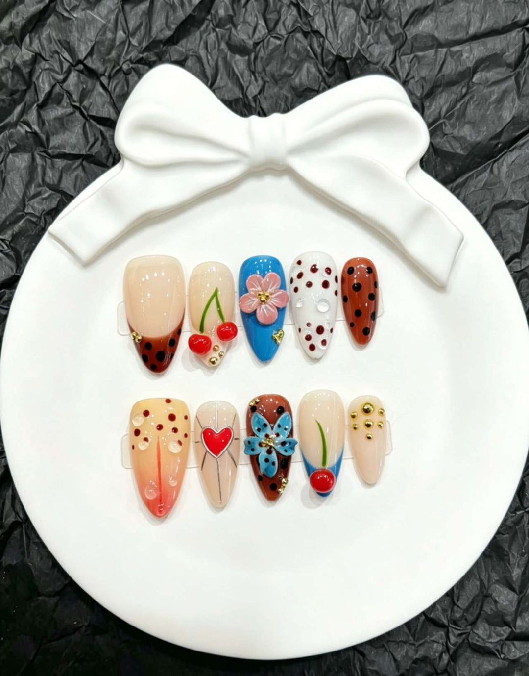 Decorative Press-On Nail Art Set with Floral and Whimsical Designs