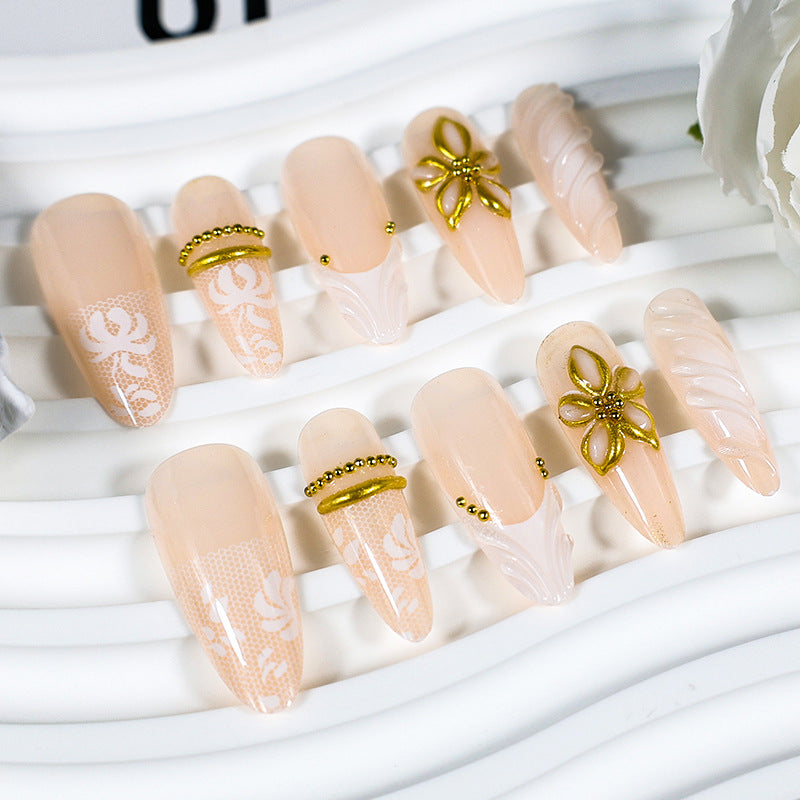 Artificial nail set with elegant flower and glitter details Stornfield