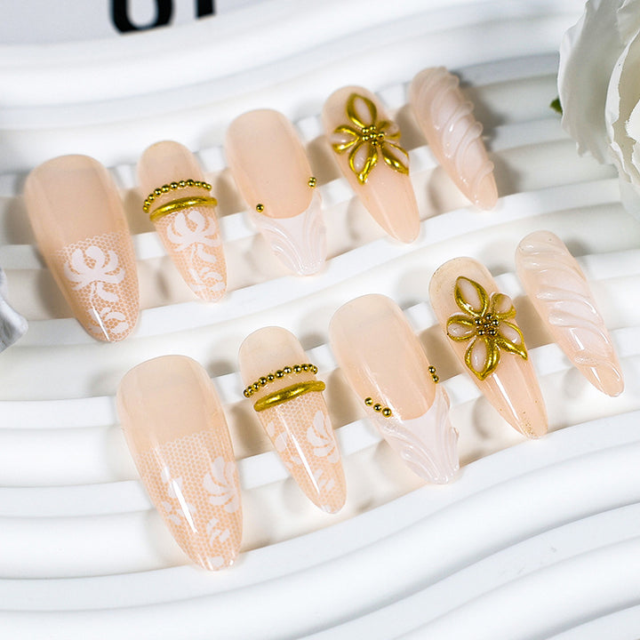 Artificial nail set with elegant flower and glitter details Stornfield