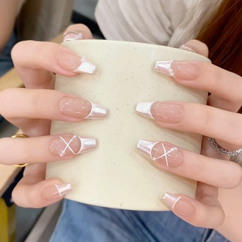 Artificial nails with heart and glitter accents Stornfield