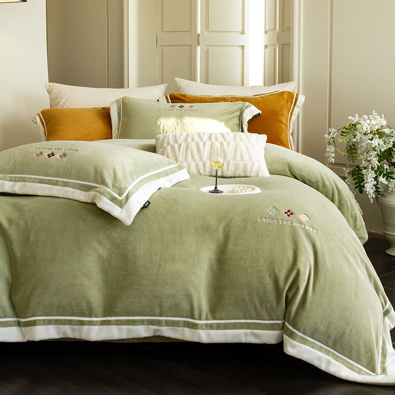 Velvety duvet cover set with embroidered floral design and contrasting piping